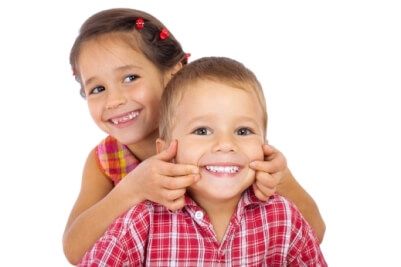 A little boy and girl smiling A little boy and girl smiling